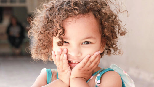 child with curly hair