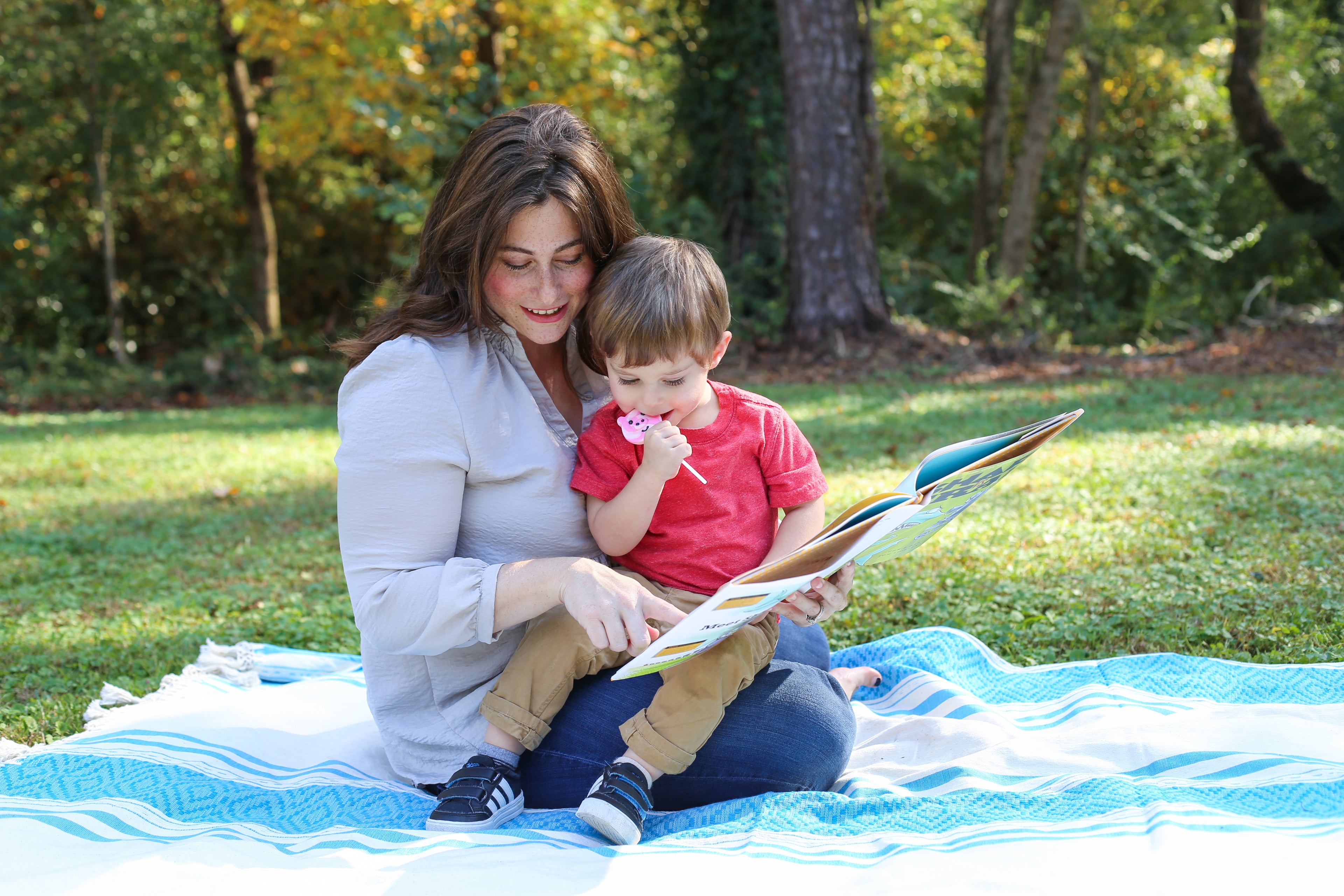 mom and boy reading