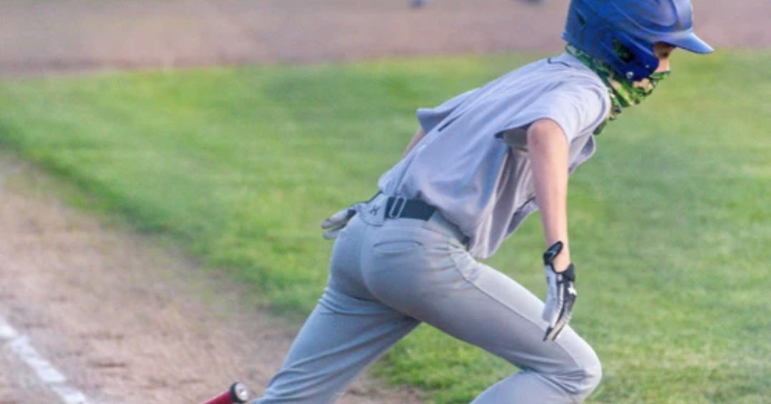 boy playing baseball