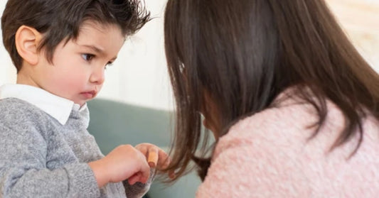 boy talking to mom