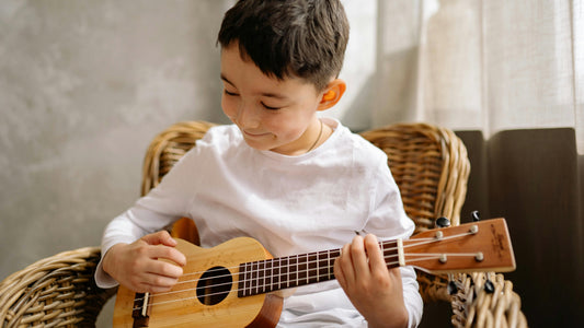 boy playing guitar