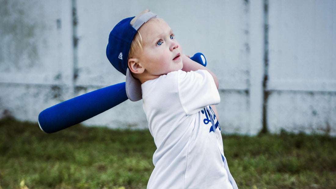 little boy playing baseball