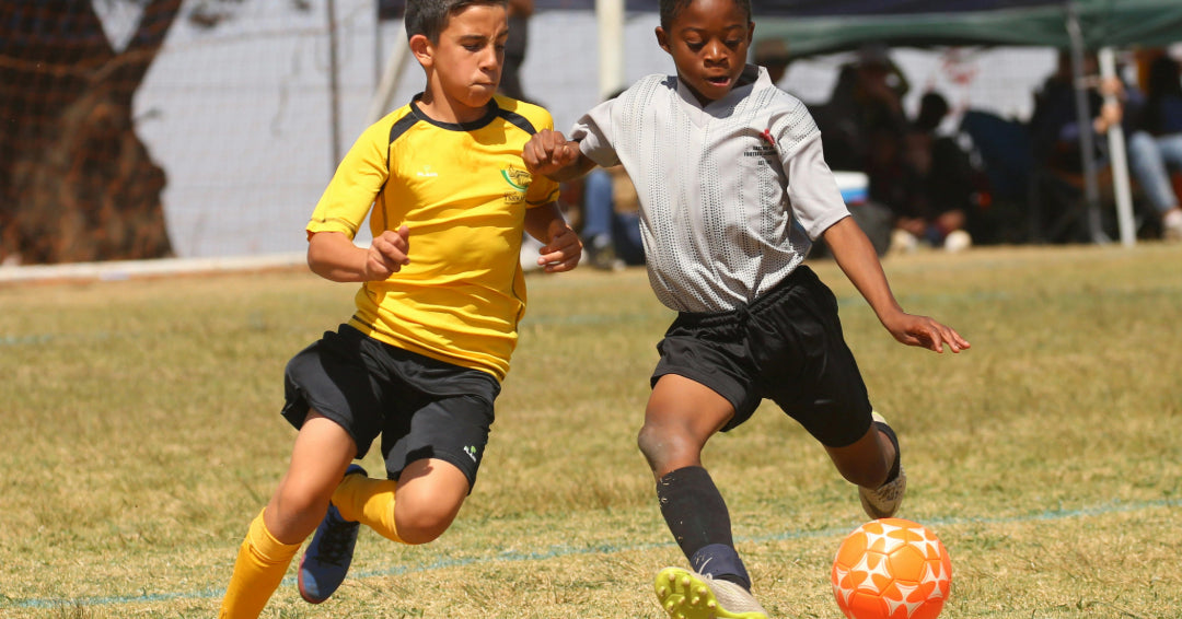 boys playing soccer