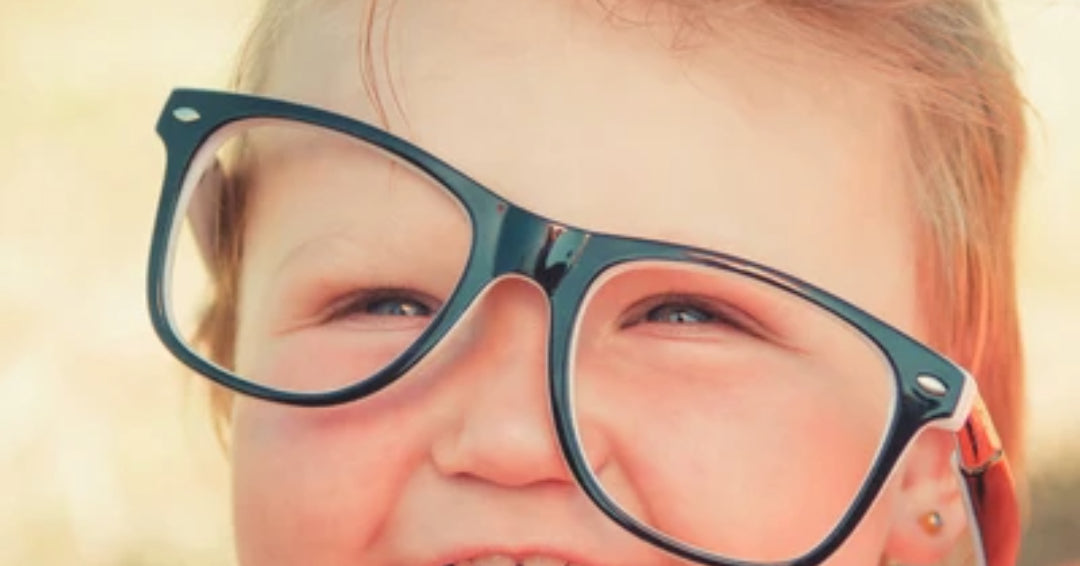 child wearing glasses