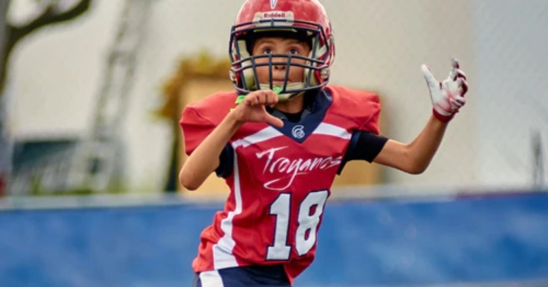 boy playing football