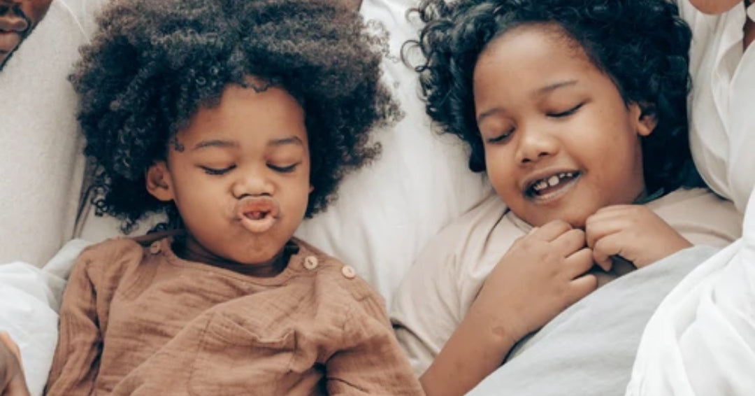 kids sleeping in bed