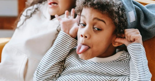 kid sticking out tongue