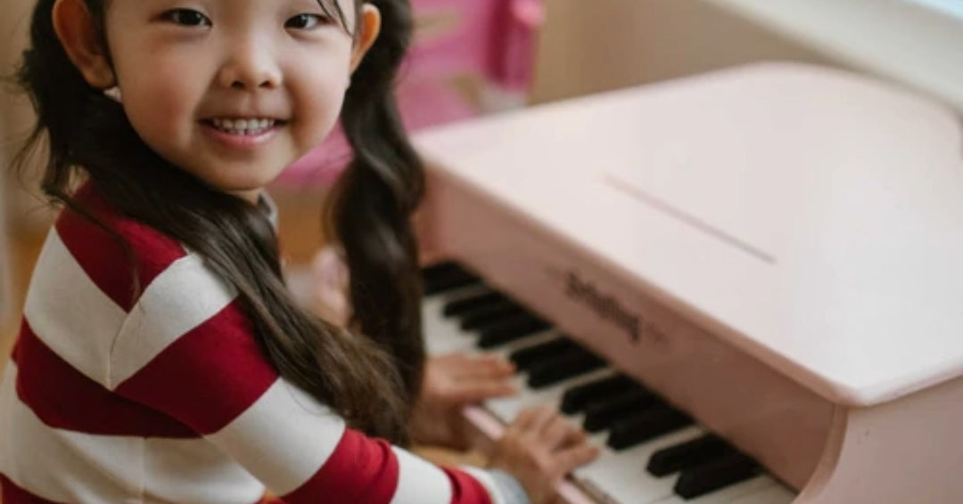 girl playing piano