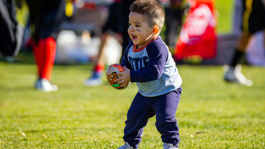 toddler playing soccer