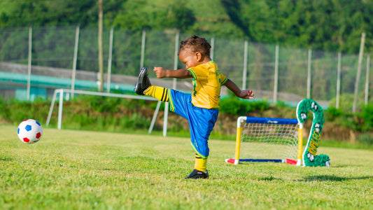 toddler playing soccer
