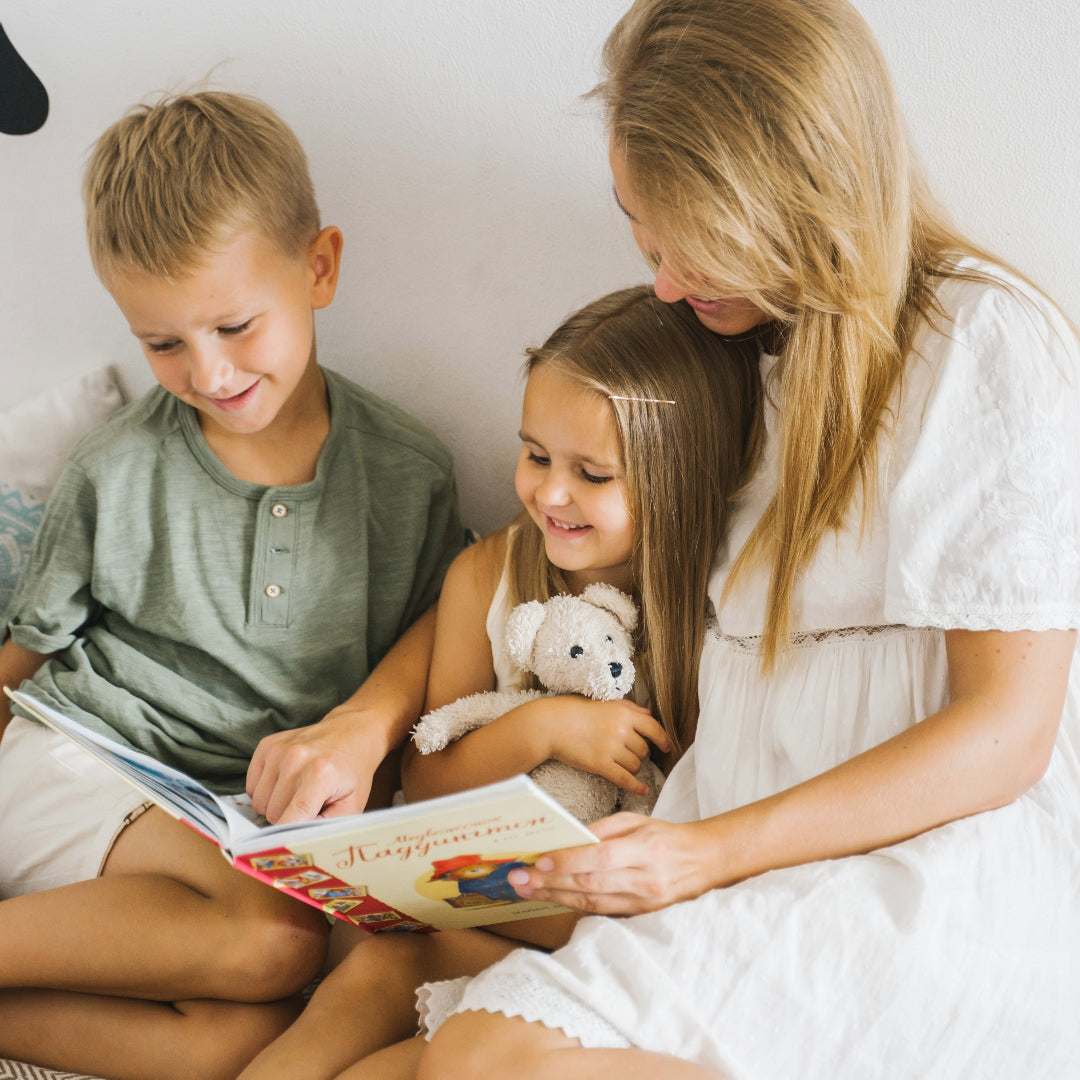 mom and kids reading books